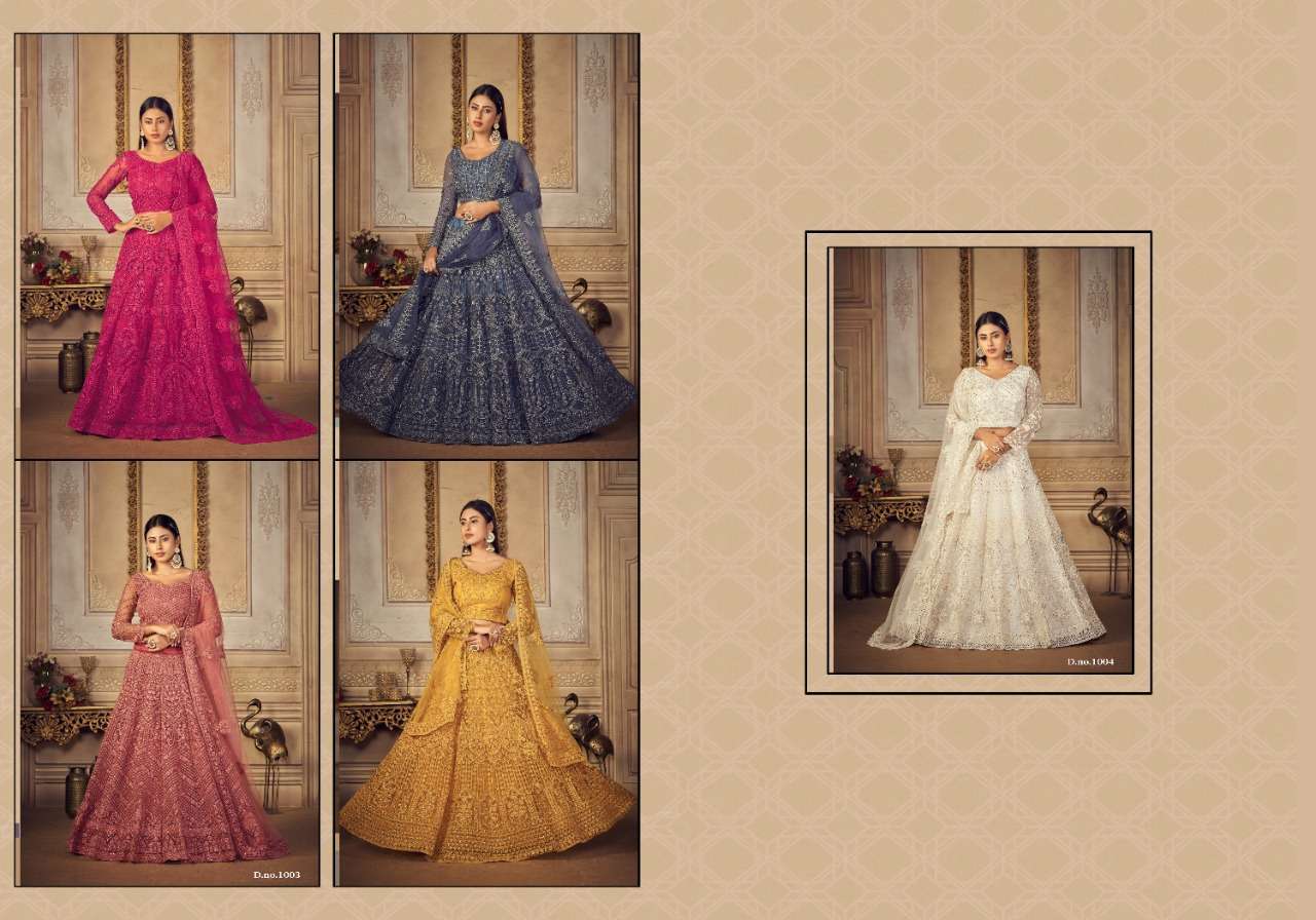 Bridal Ensemble By Vouche 1001 To 1005 Series Beautiful Colorful Fancy Wedding Collection Occasional Wear & Party Wear Net Embroidered Lehengas At Wholesale Price