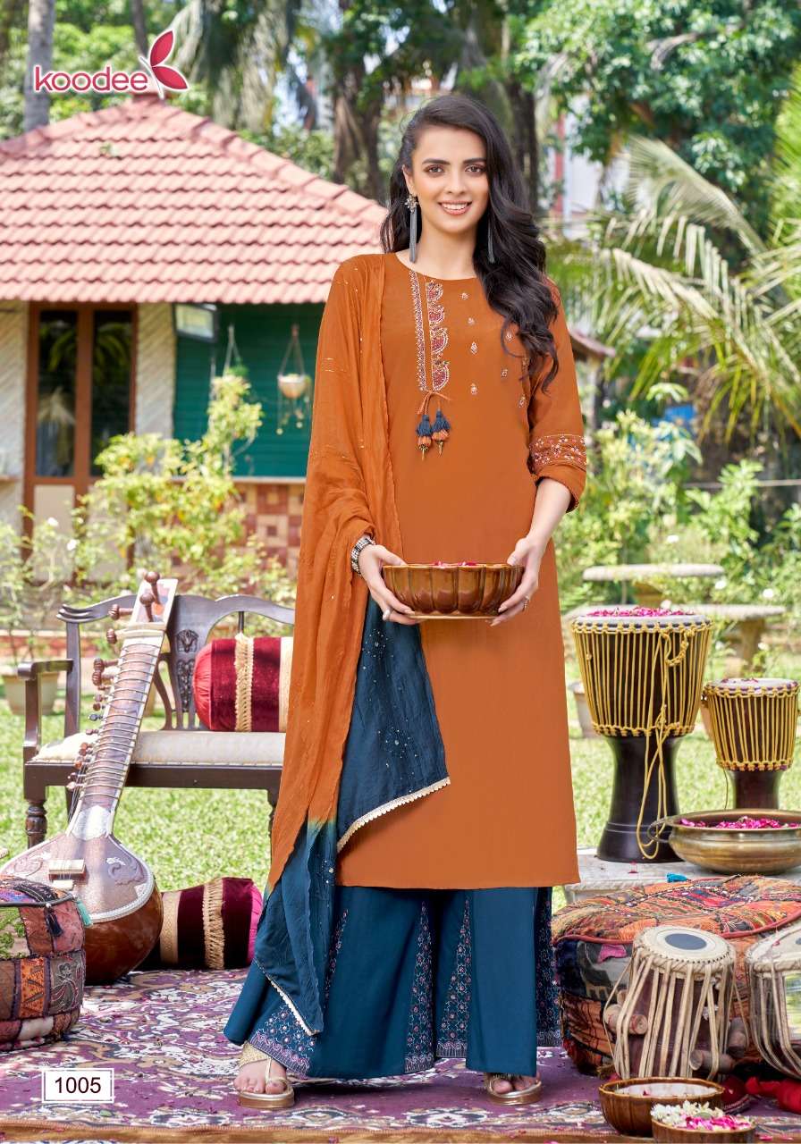 Sanaya By Koodee 1001 To 1006 Series Beautiful Festive Suits Colorful Stylish Fancy Casual Wear & Ethnic Wear Heavy Chinnon Embroidered Dresses At Wholesale Price