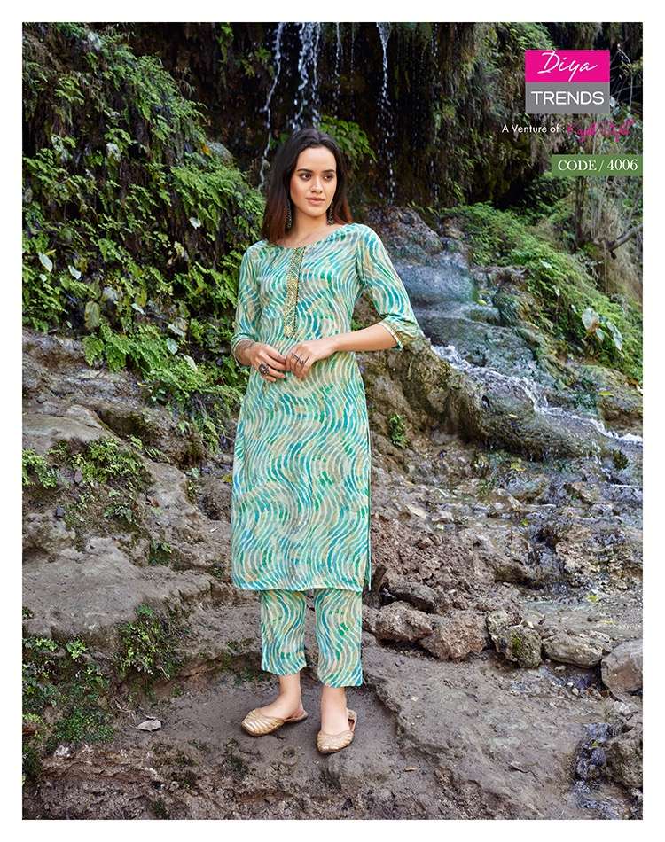 Celebration Vol-4 By Diya Trends 4001 To 4007 Series Designer Stylish Fancy Colorful Beautiful Party Wear & Ethnic Wear Collection Rayon Print Kurtis With Bottom At Wholesale Price