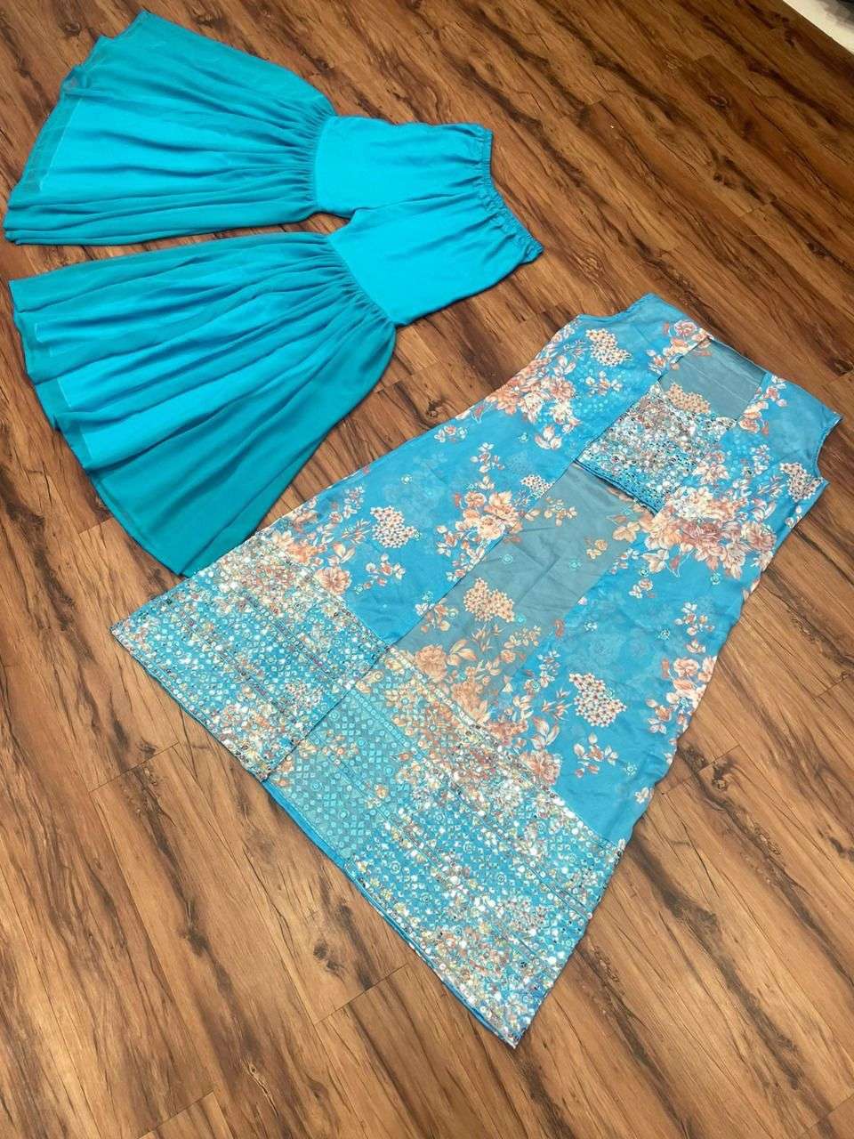 1124 By Kaamiri Beautiful Stylish Fancy Colorful Casual Wear & Ethnic Wear Tabby Silk Tops With Bottom At Wholesale Price