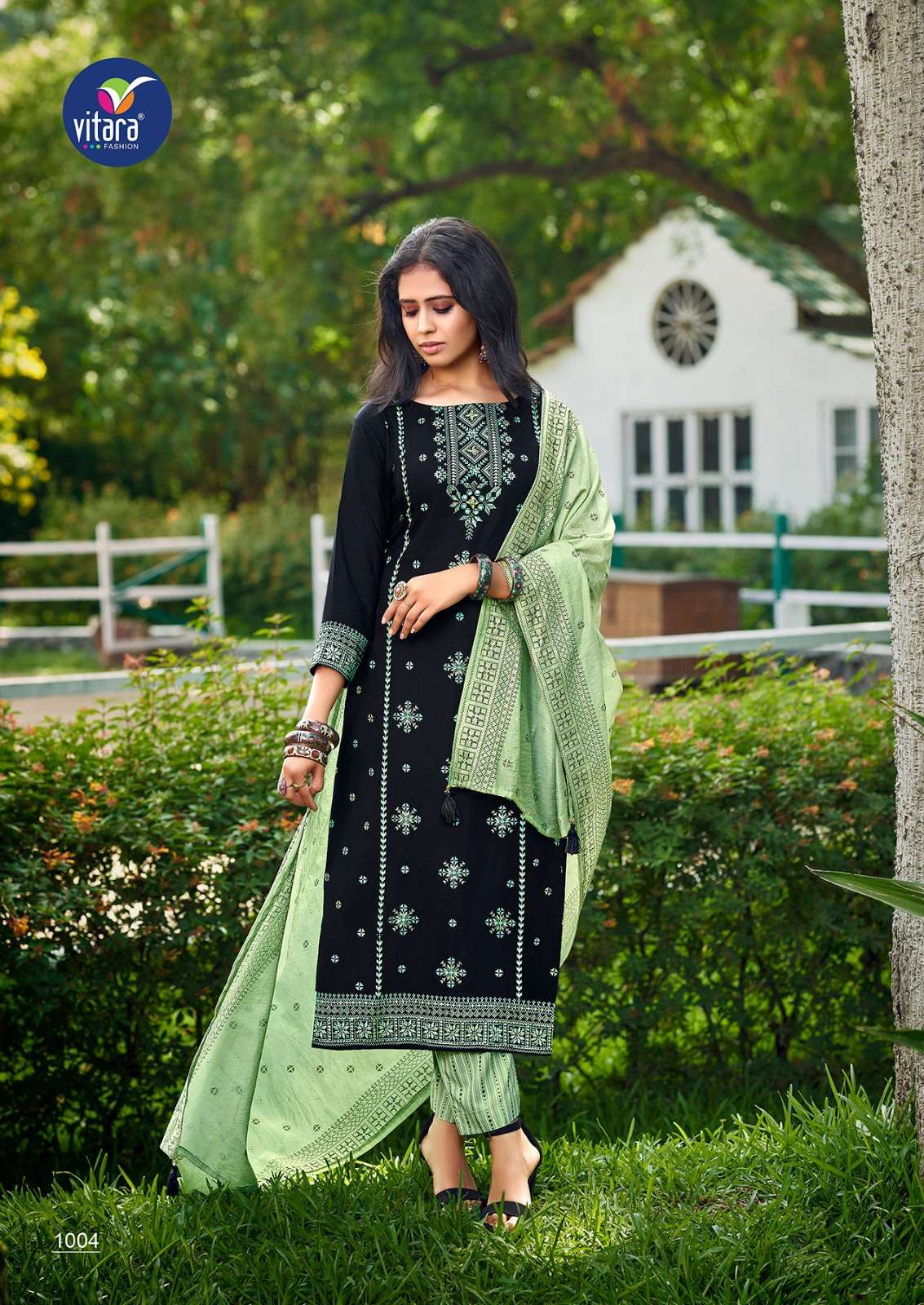 Calisto By Vitara 1001 To 1004 Series Beautiful Suits Colorful Stylish Fancy Casual Wear & Ethnic Wear Rayon Foil Digital Print Dresses At Wholesale Price