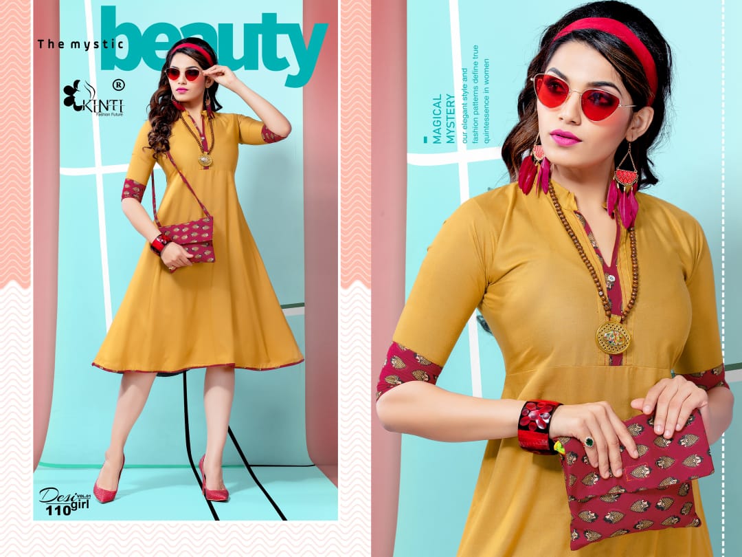 Desi Girl Vol-1 By Kinti 101 To 112 Series Indian Traditional Wear Collection Beautiful Stylish Fancy Colorful Party Wear & Occasional Wear Rayon Print Kurtis With Purse At Wholesale Price