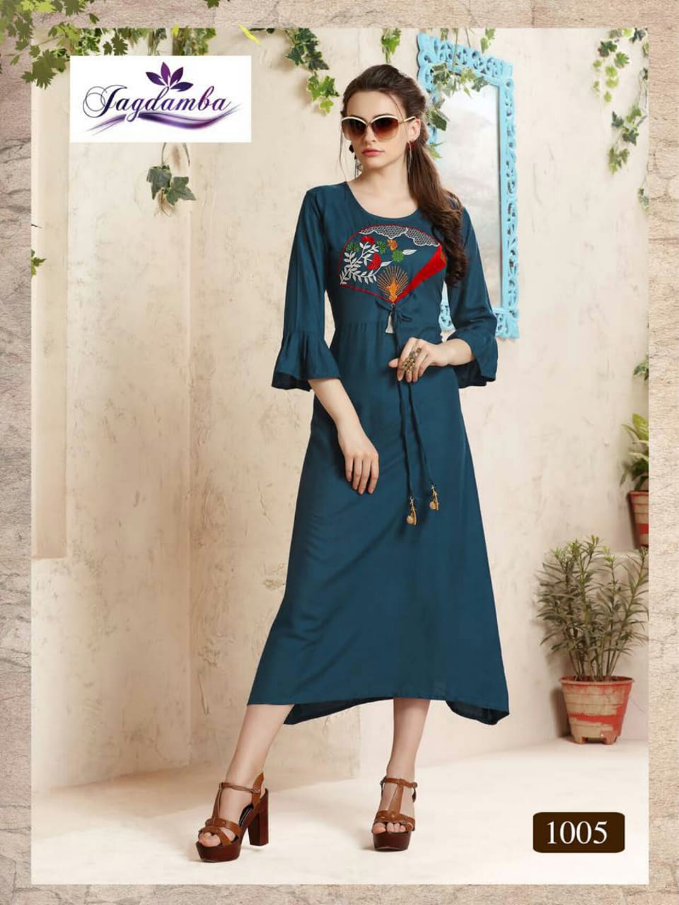 Dream Girl By Jagdamba 1001 To 1008 Series Beautiful Stylish Colorful Fancy Party Wear & Ethnic Wear & Ready To Wear Rayon Printed Kurtis At Wholesale Price