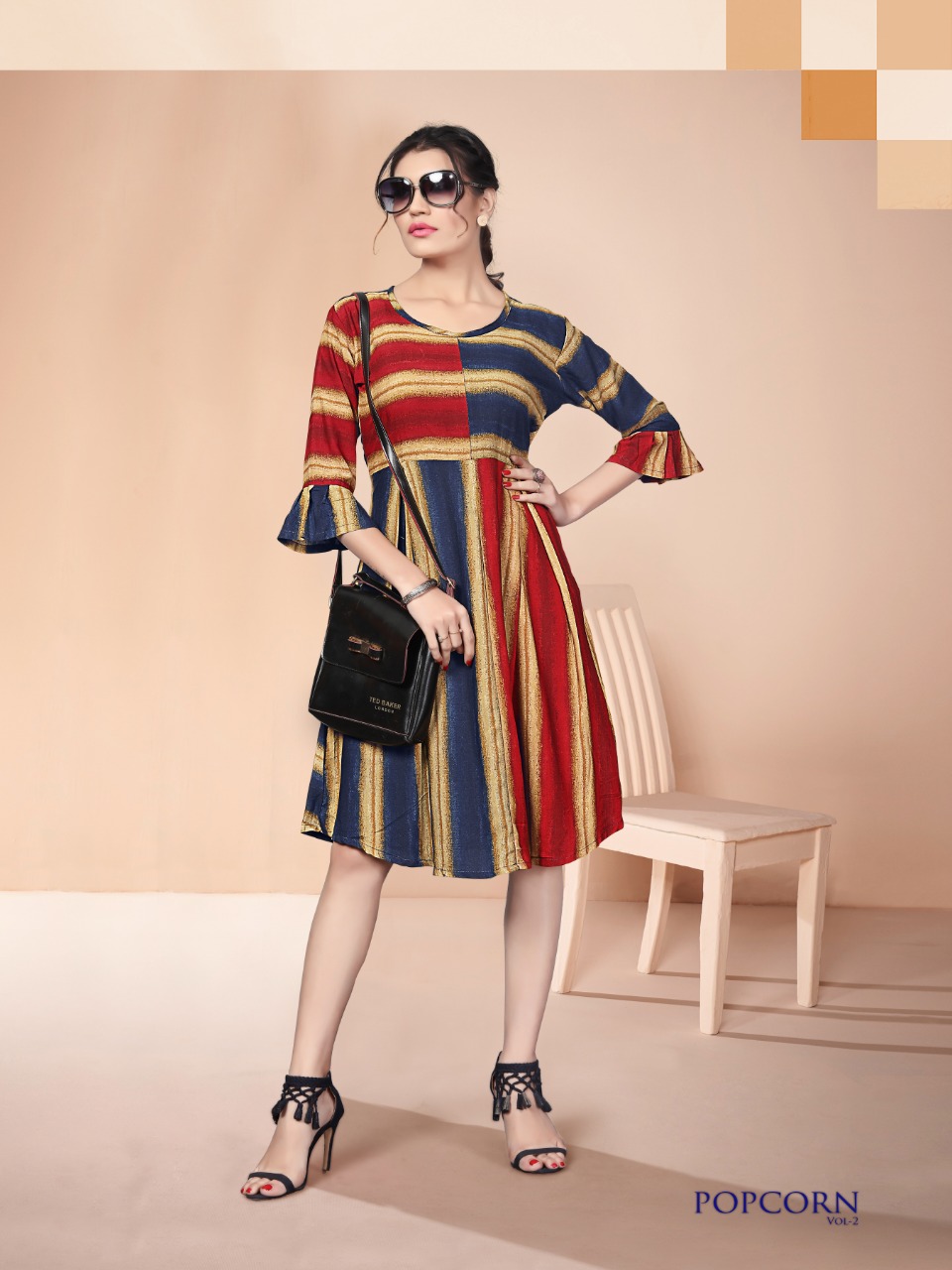 Popcorn Vol-2 By Watermelon 1001 To 1008 Series Beautiful Colorful Stylish Fancy Casual Wear & Ethnic Wear & Ready To Wear Heavy Rayon Printed Kurtis With Belt At Wholesale Price