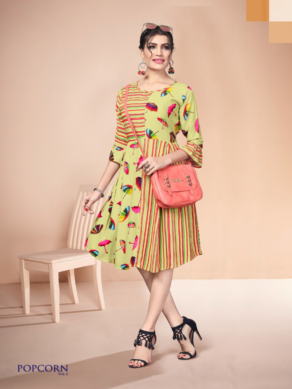 Popcorn Vol-2 By Watermelon 1001 To 1008 Series Beautiful Colorful Stylish Fancy Casual Wear & Ethnic Wear & Ready To Wear Heavy Rayon Printed Kurtis With Belt At Wholesale Price