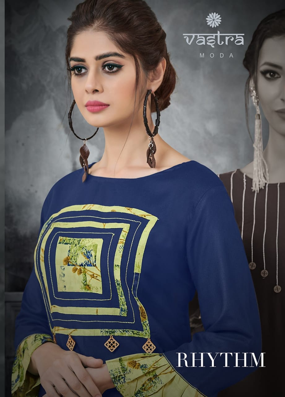 Rhythm Vol-1 By Vastra Moda 1001 To 1008 Series Beautiful Colorful Stylish Fancy Casual Wear & Ethnic Wear & Ready To Wear Premium Rayon Printed Kurtis With Palazzo At Wholesale Price
