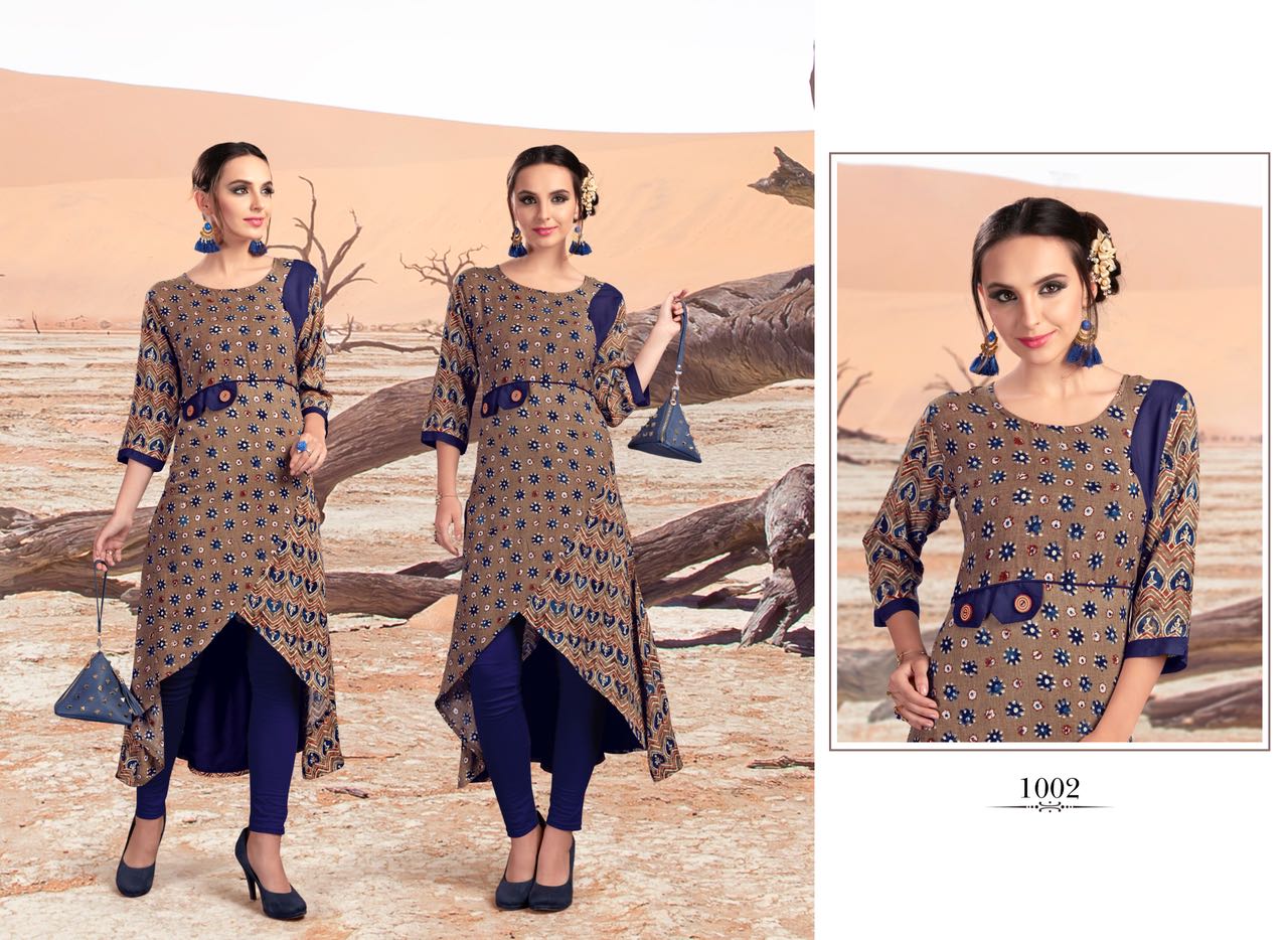 Shine By Amaaya Garments 1001 To 1009 Series Beautiful Stylish Fancy Colorful Casual Wear & Ethnic Wear Rayon Printed Kurtis At Wholesale Price